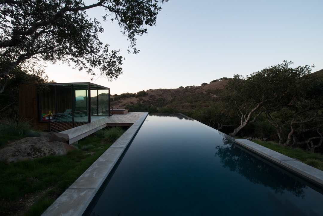 The small pavilion provides a sheltered destination from the house. It's the perfect place to enjoy a book in the serenity of the natural environment.