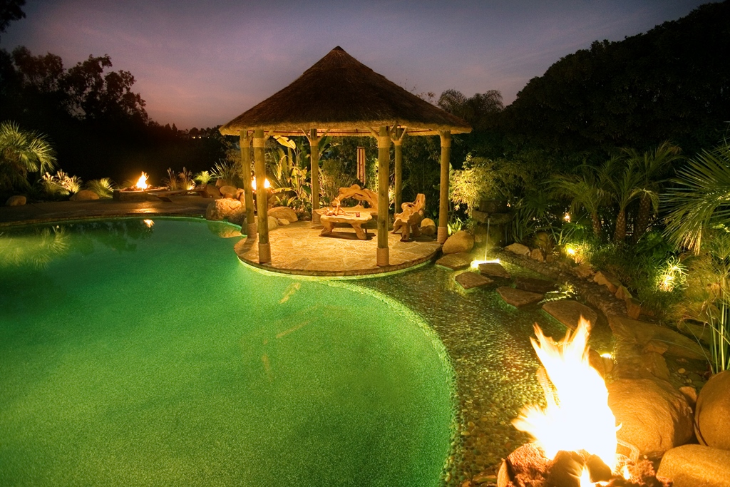 The floating steps require a little adventure to find as the path is not immediately noticeable upon entering the yard. Crossing the path and adjacent water feature clears the mind and prepares guests for their relaxing retreat in the palapa.