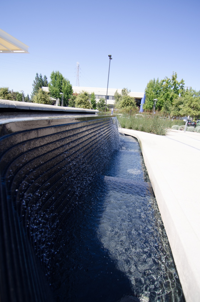 Coldspring built the granite wall panels using a multi-axis CNC machine to create the 1/2" wide x 2" tall steps while also curving the panels in their horizontal planes. It's a complicated feat of 3D modeling and stone work only possible with detailed and coordinated drawings between us, AECOM and Coldspring.